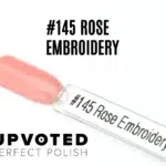 Capsule du vernis semi-permanent NailPerfect Upvoted #145 Rose Embroidery, un rose corail lumineux et raffiné.