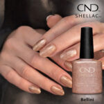 Vernis semi-permanent professionnel CND Shellac Bellini, teinte champagne doré pailleté lumineuse, finition brillante sur ongles courts et longs