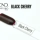 Capsule du vernis semi-permanent professionnel CND™ Shellac Black Cherry, rouge cerise foncé à la finition laquée et brillante.