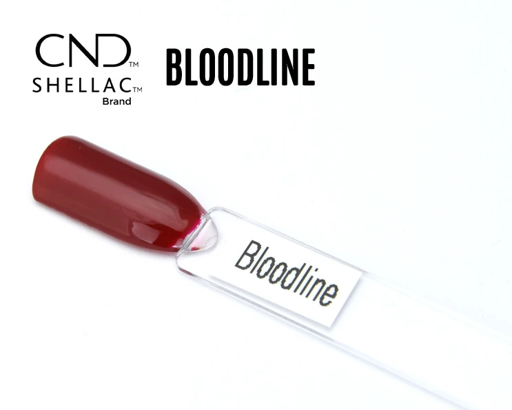 Capsule du vernis semi-permanent professionnel CND™ Shellac Bloodline, rouge bordeaux profond et brillant, à la finition miroir élégante.