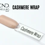 Capsule du vernis semi-permanent professionnel CND™ Shellac Cashmere Wrap, nude beige rosé au fini laqué et lumineux.