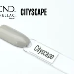 Le visuel montre la capsule du vernis CND™ Shellac Cityscape, gris perle brillant et élégant à la finition laquée.