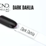 Capsule du vernis semi-permanent professionnel CND™ Shellac Dark Dahlia, violet prune foncé et intense, à la finition miroir brillante.