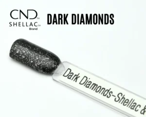Capsule du vernis semi-permanent professionnel CND™ Shellac Dark Diamonds, noir profond pailleté d’argent à la brillance miroir.