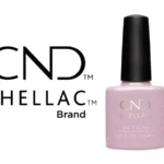 Vernis semi-permanent CND™ Shellac Lavender Lace (7,3 ml) – lavande rosé nacré délicat et lumineux. Tenue jusqu’à 3 semaines, brillance miroir, dépose douce. Disponible à 15,90 € sur RBBE.fr.