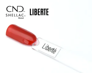 Capsule du vernis semi-permanent professionnel CND™ Shellac Liberté, rouge vif et lumineux, finition brillante effet miroir.