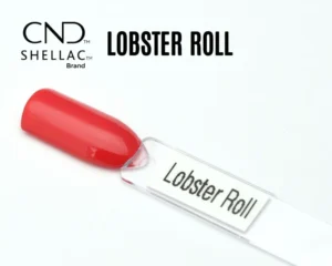 Capsule du vernis semi-permanent professionnel CND™ Shellac Lobster Roll, rouge corail lumineux avec une touche de rose, à la finition laquée effet miroir.