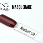 Capsule du vernis semi-permanent professionnel CND™ Shellac Masquerade, rouge bordeaux profond au fini brillant et satiné.