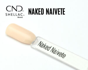 Capsule du vernis semi-permanent professionnel CND™ Shellac Naked Naïveté, beige rosé clair translucide au fini crème brillant et homogène.