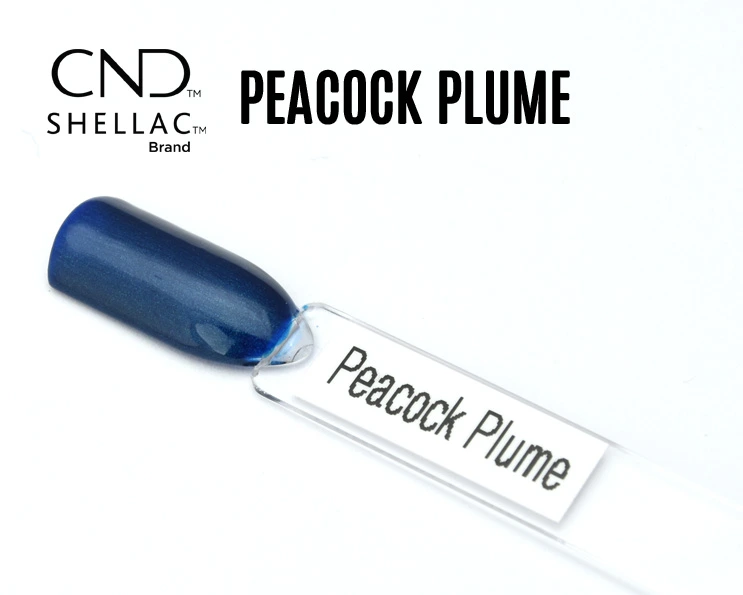 Capsule du vernis semi-permanent professionnel CND™ Shellac Peacock Plume, bleu nuit profond aux reflets irisés métalliques.