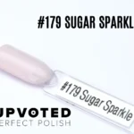 apsule du vernis semi-permanent NailPerfect Upvoted #179 Sugar Sparkle, un rose nude translucide légèrement pailleté.