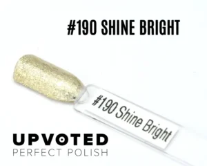 Capsule du vernis semi-permanent NailPerfect Upvoted #190 Shine Bright, un doré pailleté lumineux et chic.