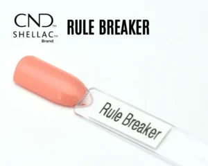 Capsule du vernis semi-permanent professionnel CND™ Shellac Rule Breaker, corail pêche lumineux et brillant au fini laqué effet miroir.
