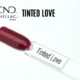 Capsule du vernis semi-permanent professionnel CND™ Shellac Tinted Love, rouge prune profond et brillant à la finition laquée.