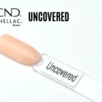 Capsule du vernis semi-permanent professionnel CND™ Shellac Uncovered, teinte nude pêche rosé au fini crème brillant.