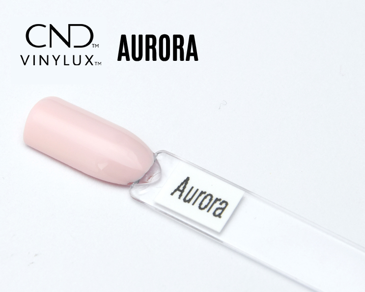 Capsule du vernis CND™ VINYLUX™ Aurora – rose poudré clair, finition laquée lumineuse, teinte nude élégante et naturelle.