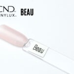Capsule du vernis CND™ VINYLUX™ Beau – rose clair semi-opaque, finition brillante naturelle et élégante.