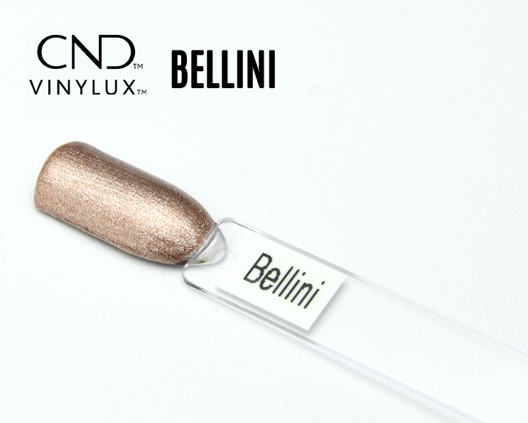 Capsule du vernis CND™ VINYLUX™ Bellini – champagne rosé scintillant, effet métallisé doux et lumineux.