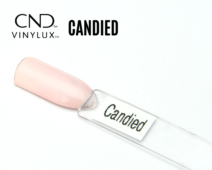 Capsule du vernis CND™ VINYLUX™ Candied – rose pastel semi-opaque au fini laiteux.