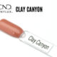 Capsule de présentation du vernis CND™ VINYLUX™ Clay Canyon, un beige terre cuite opaque au fini crème brillant, montrant fidèlement la couleur nude chaleureuse du vernis longue tenue.