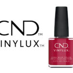 Flacon du vernis longue tenue CND™ VINYLUX™ First Love, présenté en rose framboise chaud, fini crème opaque, format professionnel 15 ml.