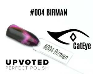 Capsule du vernis semi-permanent NailPerfect Upvoted Cat Eye #004 Birman, noir profond aux reflets rose-fuchsia et dorés.