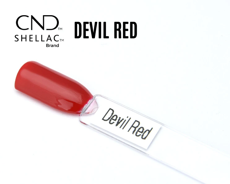 Capsule du vernis semi-permanent professionnel CND™ Shellac Devil Red, rouge vif et chaud, à la finition brillante effet miroir.