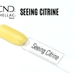 Capsule du vernis semi-permanent professionnel CND™ Shellac Seeing Citrine, jaune pâle nacré et lumineux au fini brillant.