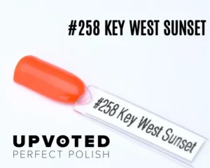 Capsule du vernis semi-permanent NailPerfect Upvoted #258 Key West Sunset, orange corail vif et lumineux.