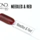 Capsule du vernis semi-permanent professionnel CND™ Shellac Needles & Red, rouge translucide profond agrémenté de fines paillettes sombres pour un rendu scintillant et élégant.