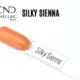 Capsule du vernis semi-permanent professionnel CND™ Shellac Silky Sienna, orange doux et lumineux au fini brillant.
