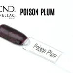 Capsule du vernis semi-permanent professionnel CND™ Shellac Poison Plum, violet prune foncé translucide aux paillettes bordeaux scintillantes.