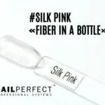 Capsule du Fiber in a Bottle NailPerfect Silk Pink, teinte rose très claire transparente, effet naturel et brillant, enrichi en fibres de verre, vitamine E et calcium.