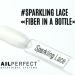 Capsule du Fiber in a Bottle NailPerfect Sparkling Lace, blanc nacré scintillant à reflets argentés, effet brillant et élégant, enrichi en fibres, vitamine E et calcium.