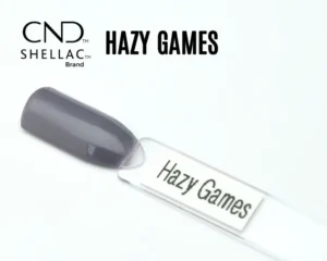 Capsule du vernis semi-permanent professionnel CND™ Shellac Hazy Games, gris fumé profond et brillant à la finition laquée effet miroir.
