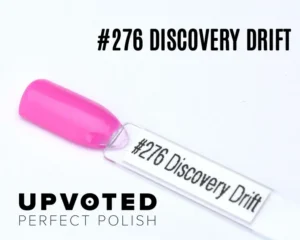 Capsule du vernis semi-permanent NailPerfect Upvoted #276 Discovery Drift, rose néon vif et lumineux.
