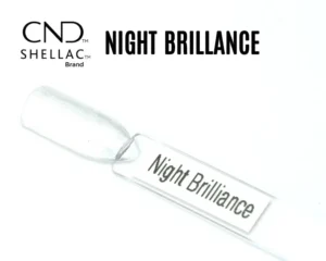 Capsule du vernis semi-permanent professionnel CND™ Shellac Night Brilliance, blanc argenté scintillant aux reflets nacrés et effet givré.