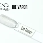 Capsule du vernis semi-permanent professionnel CND™ Shellac Ice Vapor, transparent à paillettes argentées au fini scintillant et lumineux.