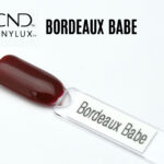 Capsule du vernis CND™ VINYLUX™ Bordeaux Babe – bordeaux profond opaque à la brillance intense.