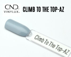 Capsule de présentation du vernis CND™ VINYLUX™ Climb To The Top-AZ, un bleu gris opaque au fini crème lisse, illustrant fidèlement la teinte froide et moderne du vernis longue tenue.