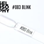 Capsule du vernis semi-permanent AstonishingNails Gelosophy #083 Blink, un blanc nacré scintillant aux reflets subtils
