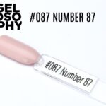 Capsule du vernis semi-permanent AstonishingNails Gelosophy #087 Number 87, un beige rosé nude doux et élégant.