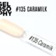 Capsule de présentation du vernis permanent AstonishingNails Gelosophy #135 Caramilk, beige clair crémeux avec finition brillante.