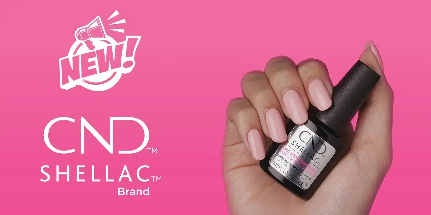 Flacon CND Shellac Epic Smoothing Base posé sur une table de manucure – base lissante végan, sans HEMA, pour une adhérence parfaite et une surface d’ongle ultra-lisse.