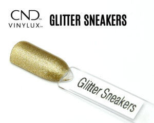 apsule de présentation du vernis CND™ VINYLUX™ Glitter Sneakers, un or pailleté scintillant, chargé en micro-paillettes dorées, avec un fini glitter couvrant et lumineux.